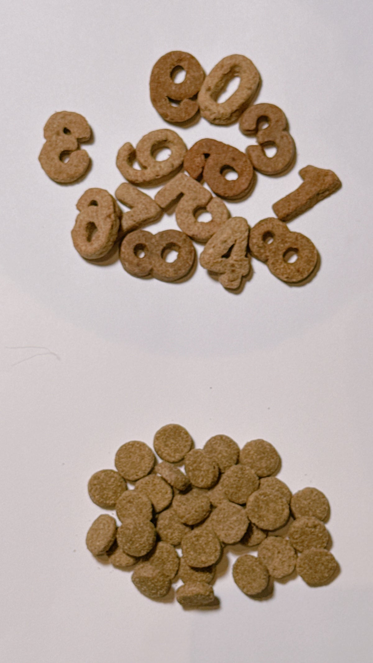 Close-up of Lucky Bustar number-shaped and round chicken treats